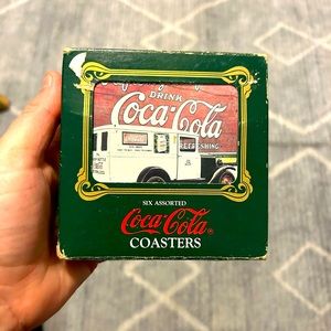 Coca Cola vintage coasters 
New in box, box a tad bit beat up